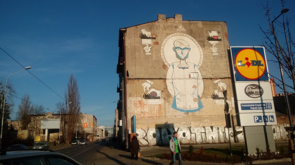 Andrzej Poprostu mural in Lodz on Piotrkowska