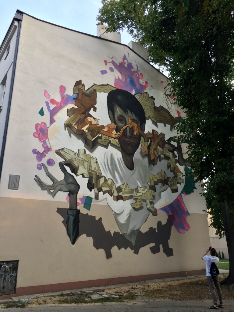 mural with man by Sebastian Bozek