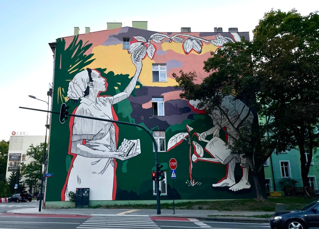 mural with women and cacao In lodz