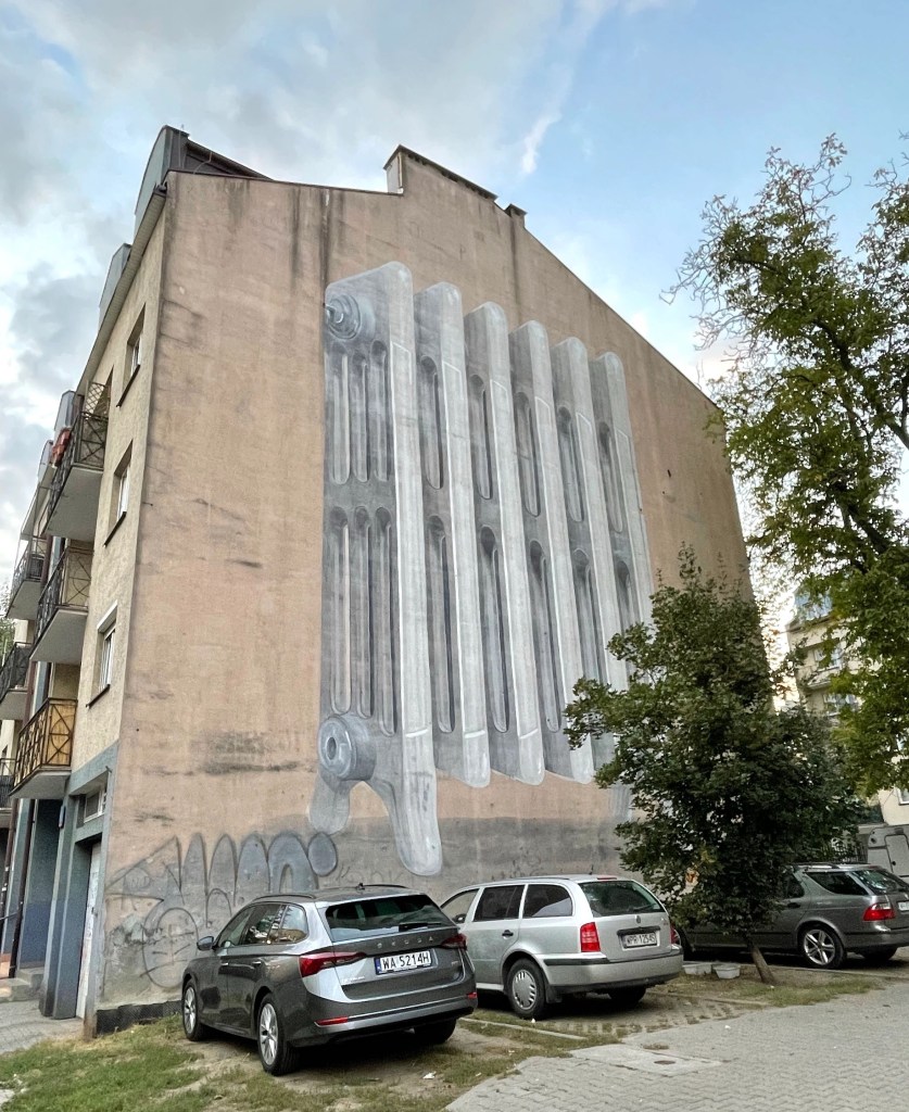mural with a radiator by escif in Warsaw