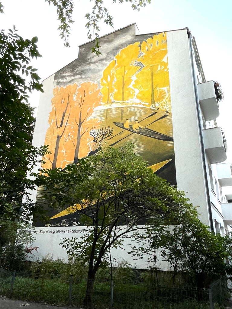 yellow mural with canoeing 