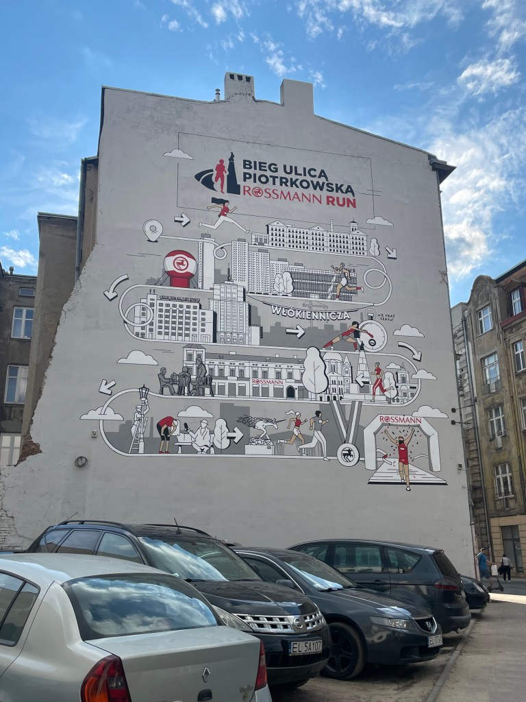 Mural by Gouda Works in Lodz