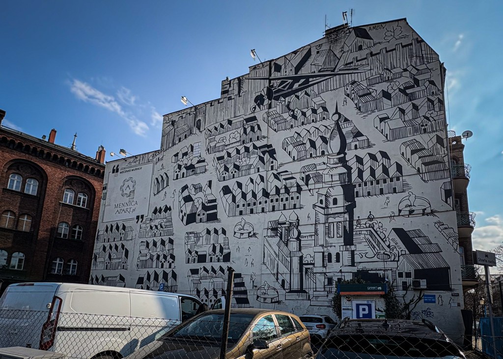 Mural in Poznan mennica czarno bialy z budynkami