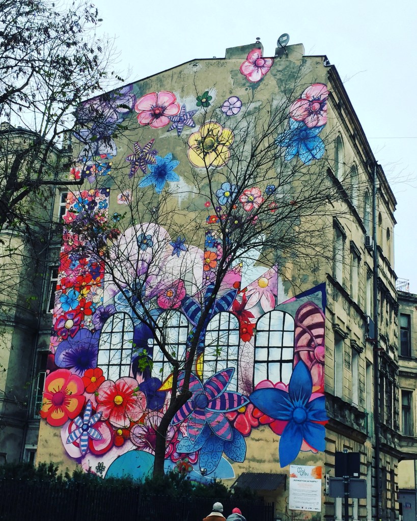 mural with flowers on the factory in lodz