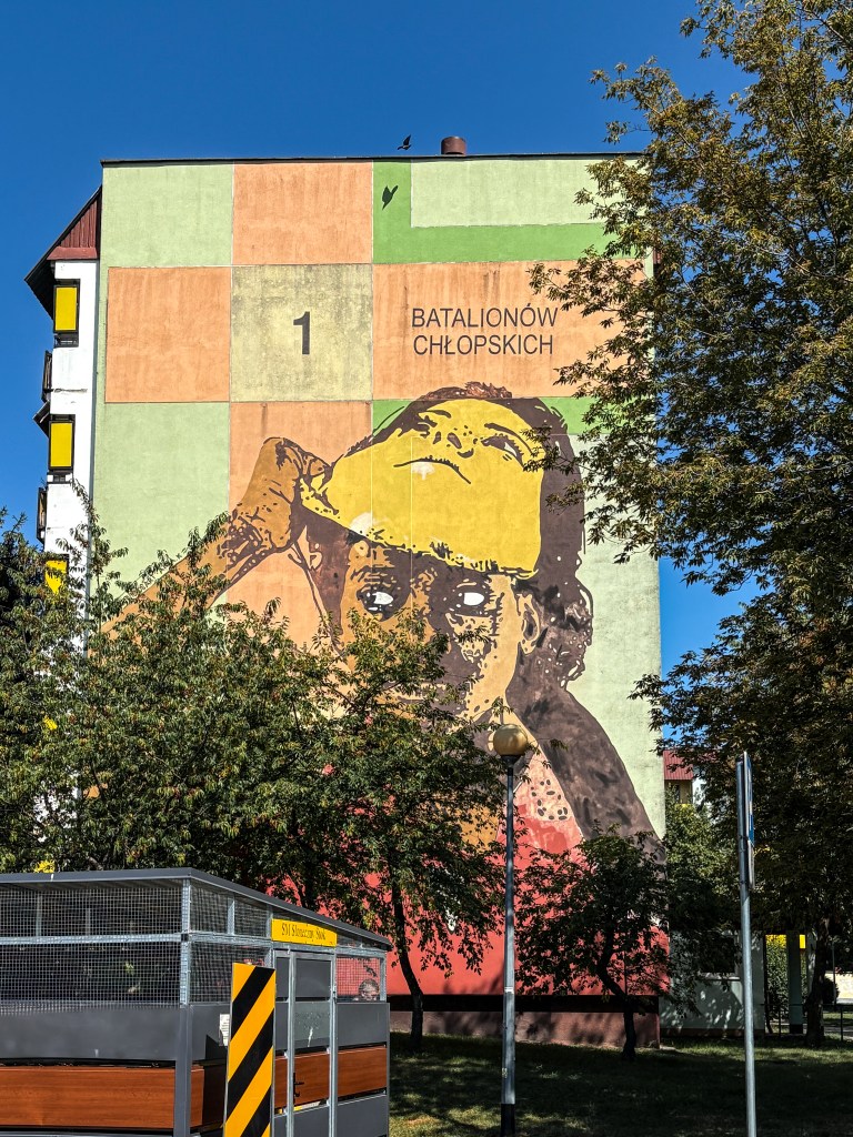 mural with a girl with a mask in Białystok