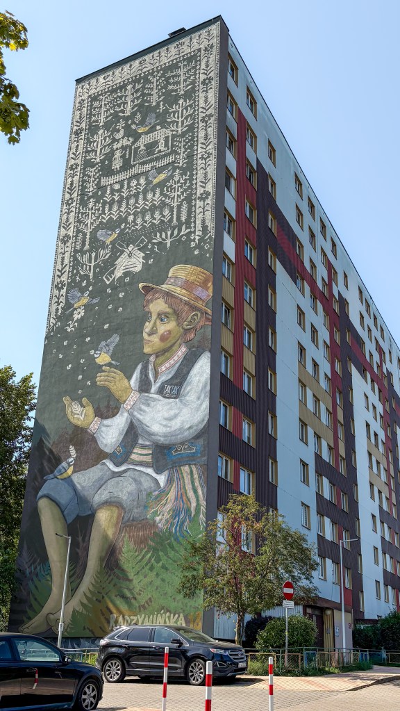 folk mural with a boy