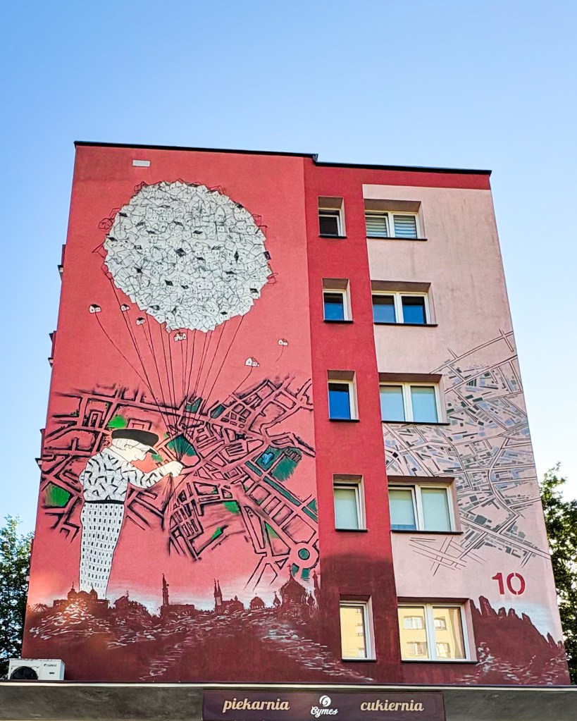 mural with a man and the map
