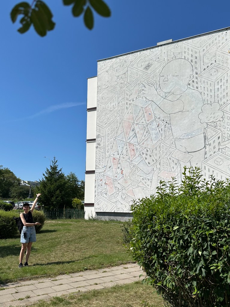 black-white mural with house of cards and kids