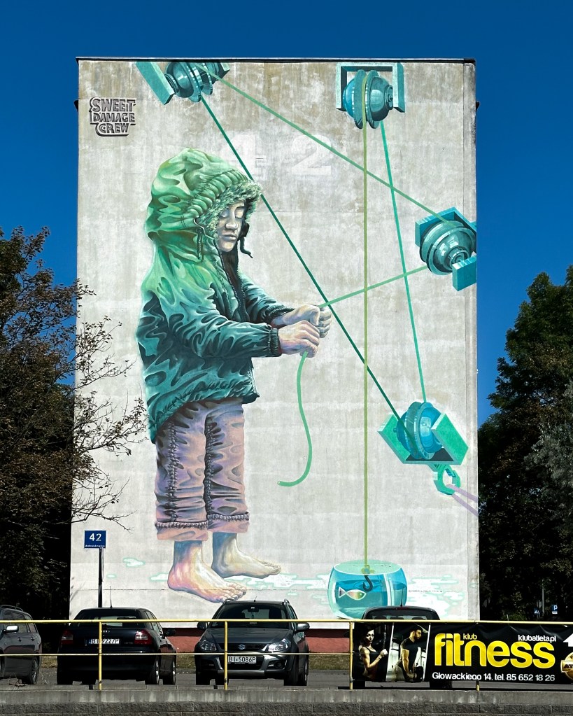 mural with a boy and a fishing rod