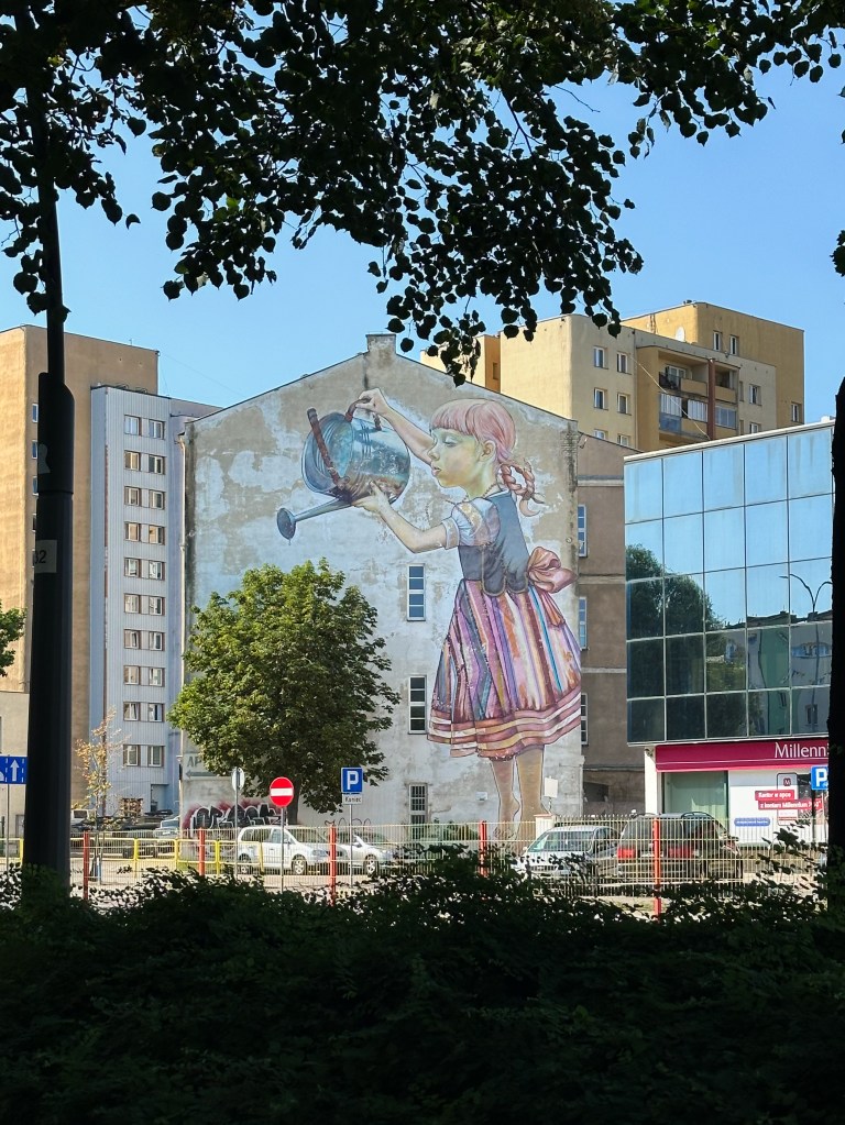 mural with a girl and water can