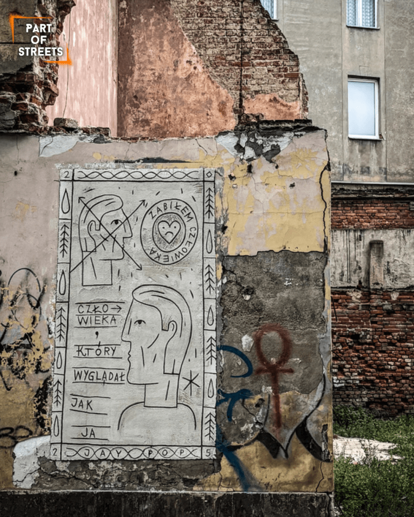 JAY POP mural on a tenement building in Łódź, Poland.