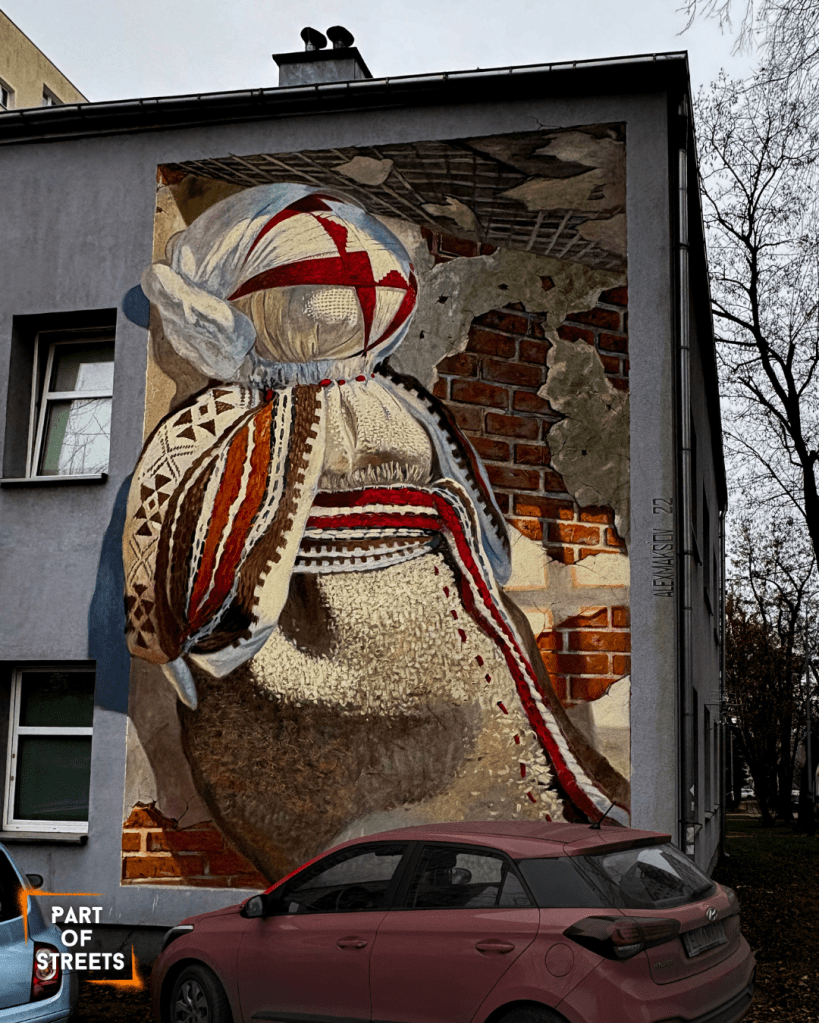 mural by Alex Maksiov in Lodz, Poland