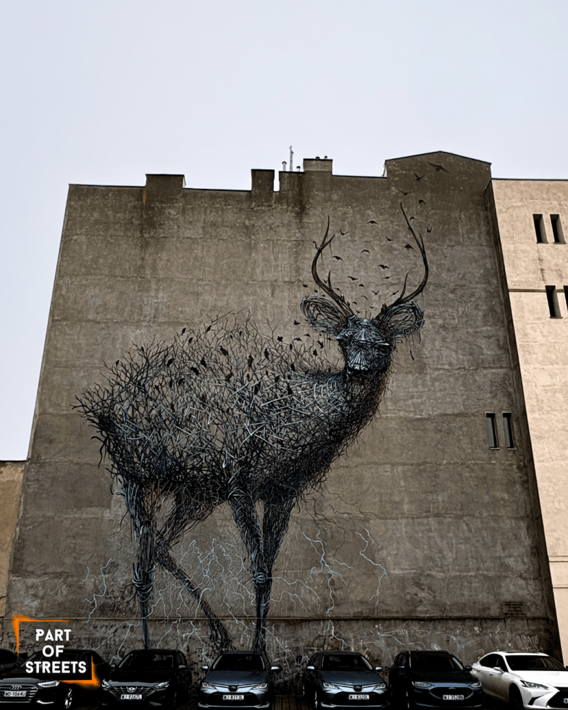 mural by DALeast in Łódź, Poland