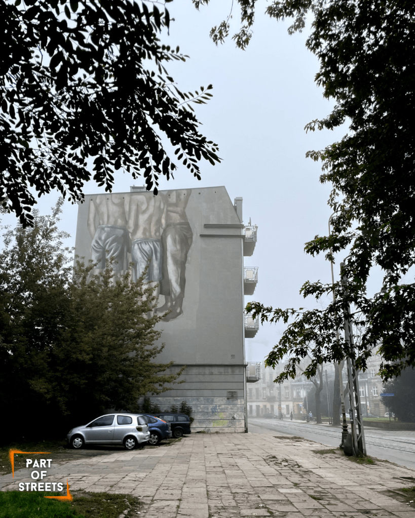 Hyuro mural on a tenement building in Łódź, Poland.