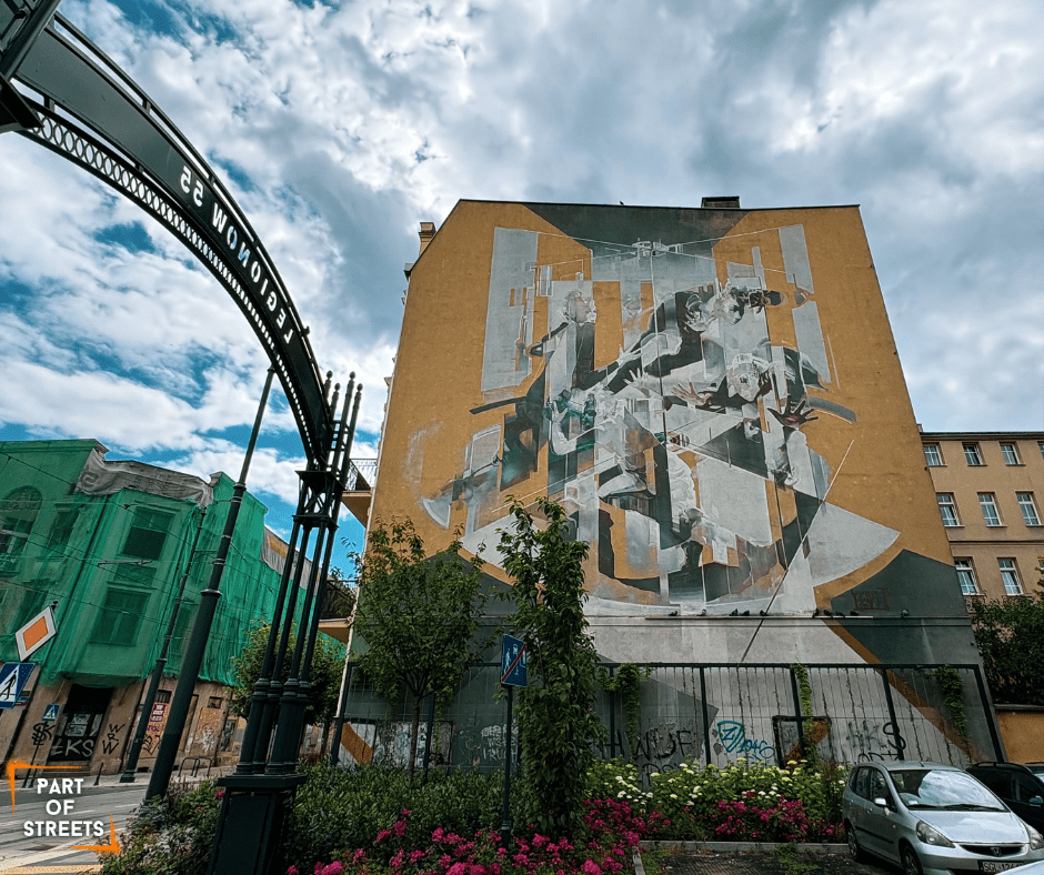 tone (Robert Proch) mural on a tenement building in Łódź, Poland.