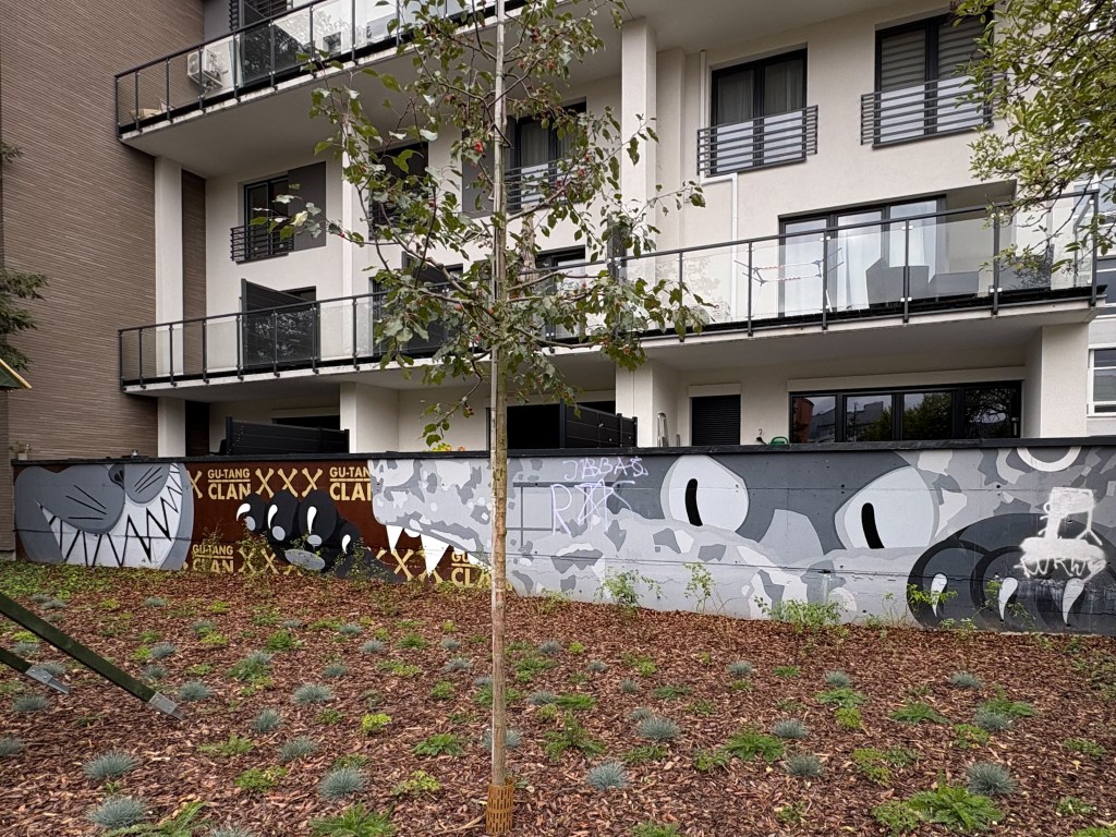GU-TANG CLAN and TOPE mural on Gdanska street in Łódź, Poland.