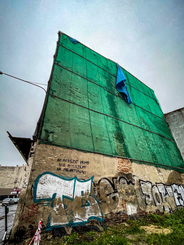 street art by Janusz Waza in Łódź, Poland. 