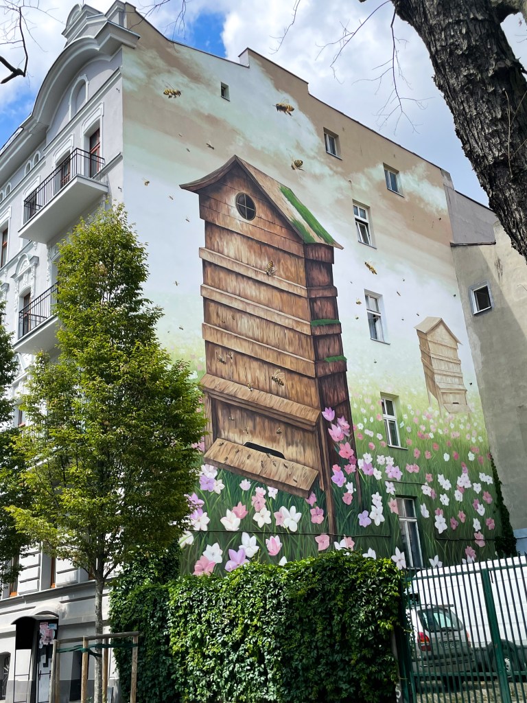 WALLART mural on a tenement building in Łódź, Poland.